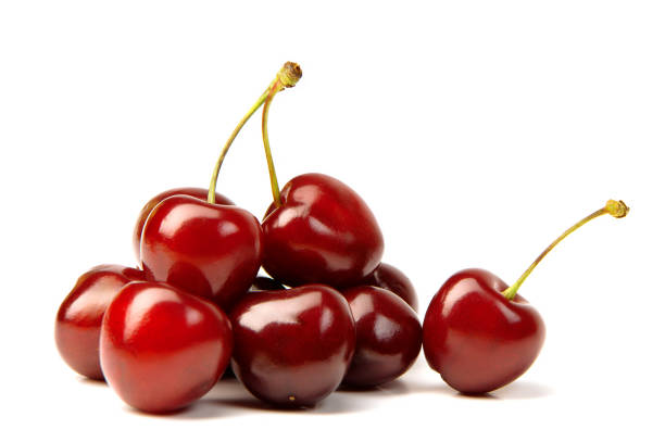istock Handful of a red cherry on a white background 1300846935