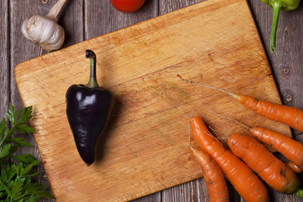 istock Ripe vegetables on a wooden table 1300847005