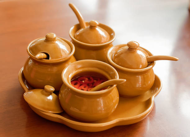 istock four clay pots with spices 1300847298