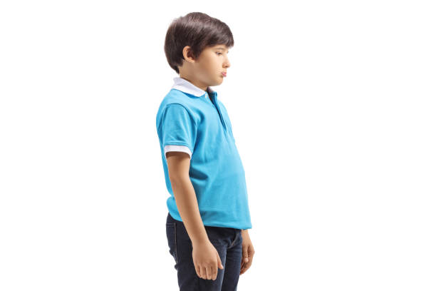 istock Unhappy boy with a sad face 1300849070