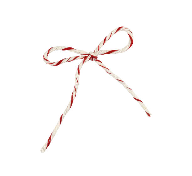 istock White and red Christmas wrapping rope tied in a bow isolated on white 1300851780