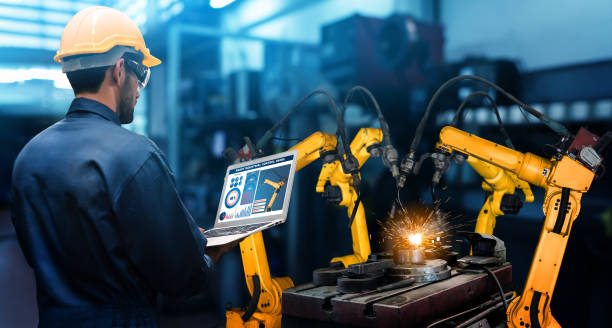 istock Smart industry robot arms for digital factory production technology 1300853385