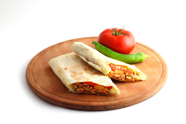 istock Doner kebab or shawarma sandwich isolated on white background 1300854559
