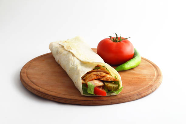 istock Doner kebab or shawarma sandwich isolated on white background 1300854560