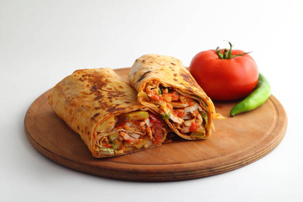 istock Doner kebab or shawarma sandwich isolated on white background 1300854569