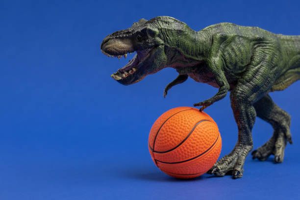 Tyrannosaurus rex on white with a little shadow around the claws.