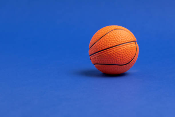 istock Basketball ball on a blue background 1300856089