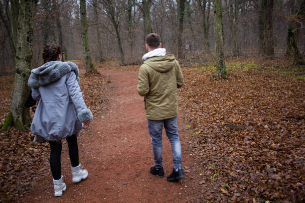 istock Two young people lost in forest 1300857492