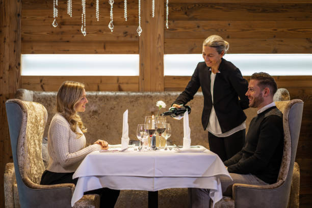 istock couple enjoying dinner for two in luxury restaurant 1300858230