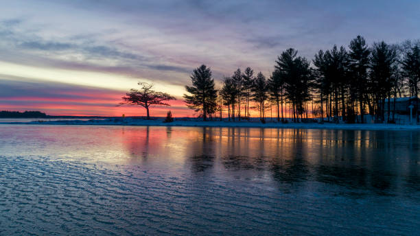 istock Detroit Point Ice Reflecting Sunrise 1300858987