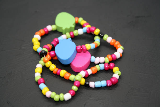 istock A bracelet made of beads on a black background. 1300862639