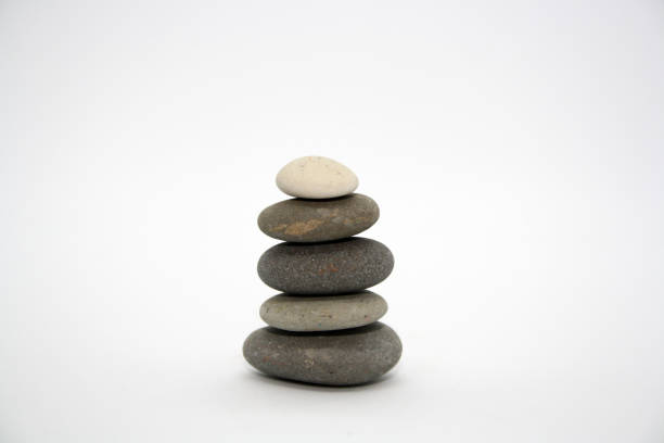 istock Gray and white sea rocks on a white background. 1300862725