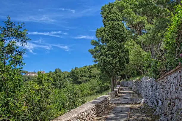 The ruins of Villa Jovis built by emperor Tiberius is located at the edge of a tall cliff on the island of Capri, Tyrrhenian sea, Italy