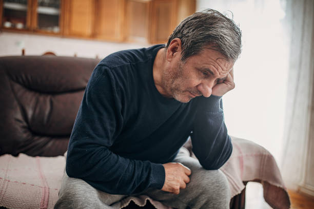 istock A depressed man because of loneliness 1300865253