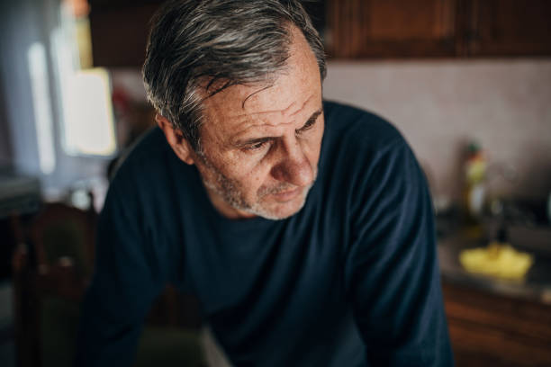 istock A depressed man because of loneliness 1300865284