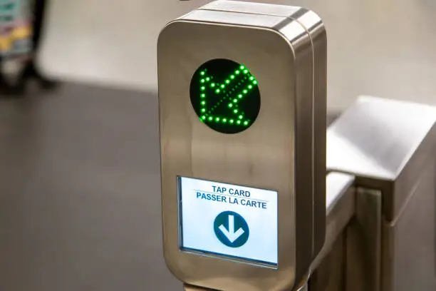 Toronto, Canada-10 November 2020: Toronto TTC Metrolinx Presto machines at a busy Bloor and Yonge station. A contactless smart card is used to gain access to public transportation.