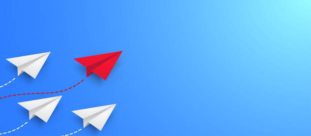 istock Leadership success business concept paper plane fly over blue background. New idea, courage, new thinking, creative decision, think differently. Lead airplane stand out of other paper plane follower. 1300865524