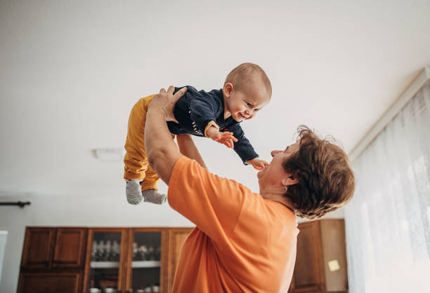 Happy grandmother and grandson Happy grandmother and grandson nanny stock pictures, royalty-free photos & images