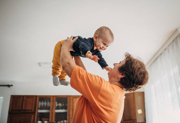 happy grandmother and grandson - nanny imagens e fotografias de stock