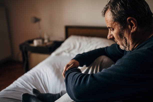 istock A depressed man because of loneliness 1300865771