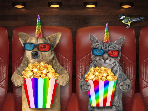 istock Pet unicorns in 3d glasses in cinema 2 1300867165