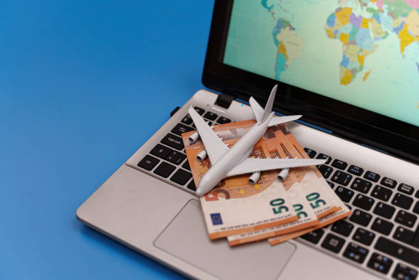 istock Toy plane on the notebook with world map. 1300870518