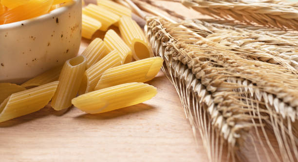 italian penne pasta from durum wheat close-up.