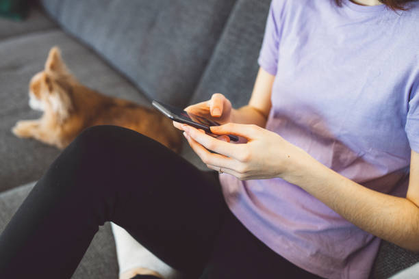 istock Young unrecognizable woman spending time on her phone 1300876239