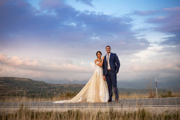 istock Fresh newlyweds standing on the road 1300876433