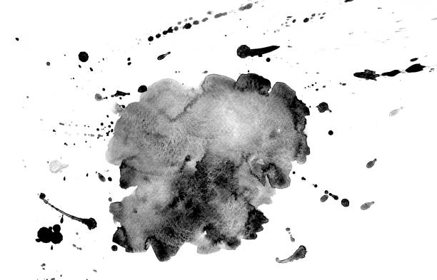 istock Black watercolor spot with splashes design element on paper 1300878377
