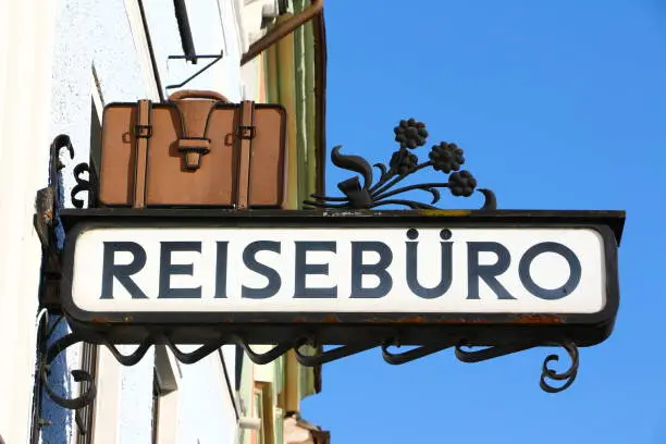 August 08, 2018, Waidhofen an der Ybbs: Advertising sign with the inscription "Travel agency" in the center of Waidhofen an der Ybbs