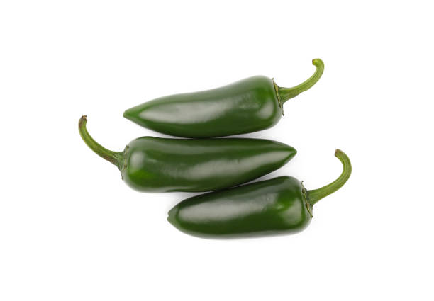 istock Close up fresh green jalapeno peppers isolated 1300881703