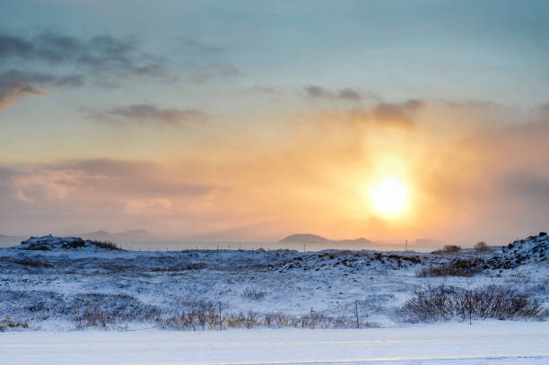 Northern dusk in winter with a low sun in a icy scenario