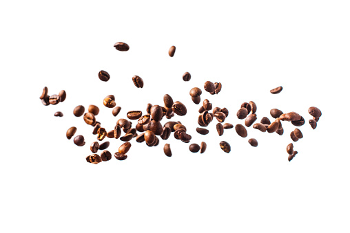 Coffee beans fly away isolated on white background