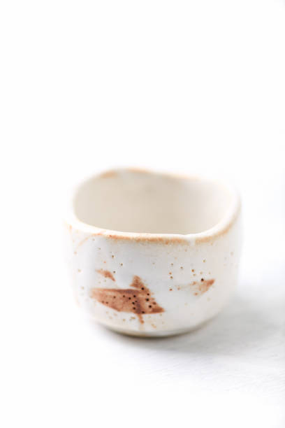istock Traditional, handcrafted ceramic on bright wooden background. Soft focus. Close up. 1300884460
