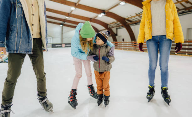 istock Family ice-skating 1300886817