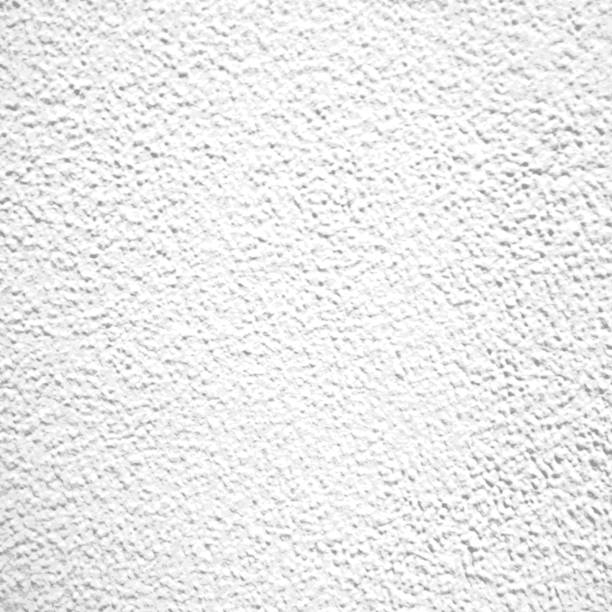 grobe weiße relief stuck wand textur hintergrund in nahaufnahme - rough backgrounds close up color image stock-grafiken, -clipart, -cartoons und -symbole