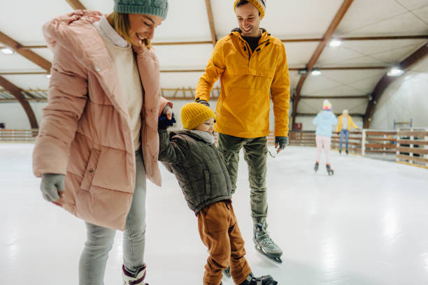 istock Little boy learning how to ice-skate 1300887126