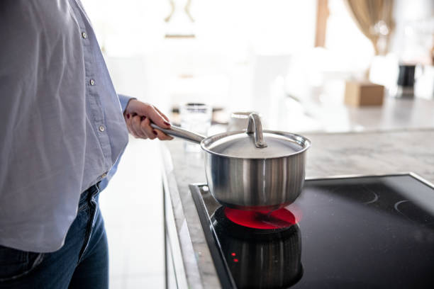 istock Woman Cooking In The Kitchen 1300887315
