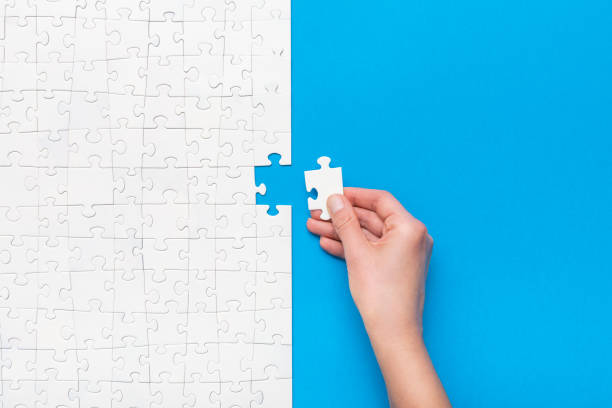 Business concept of white jigsaw puzzle.