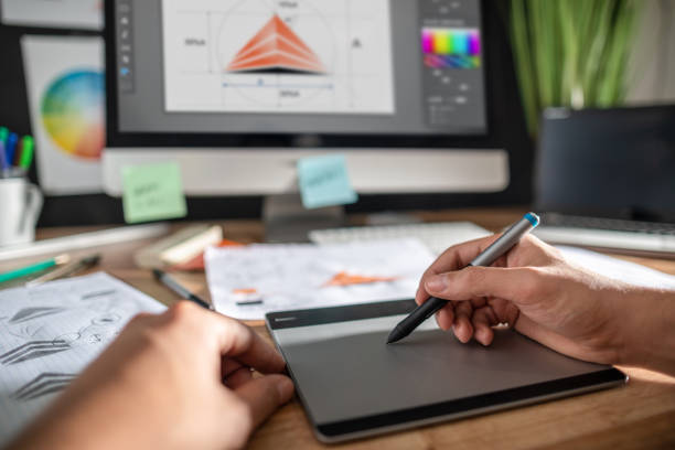 istock Graphic designer drawing sketches logo design. 1300888648