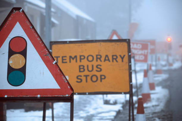 istock Road signs on the winter road 1300891087