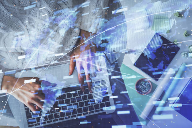 istock Double exposure of woman hands working on computer and data theme hologram drawing. Top View. Technology concept. 1300892185