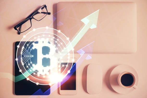 istock Double exposure of blockchain theme hologram over table with phone. Top view. Crypto technology concept. 1300892745