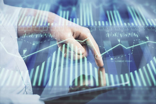 istock Double exposure of man's hand holding and using a digital device and data theme hologram drawing. Technology concept. 1300893071