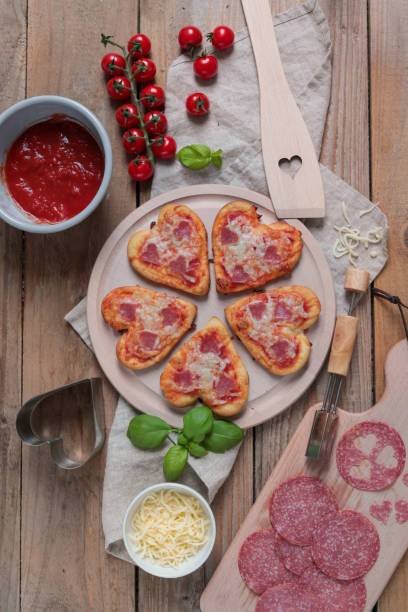 Mini Pizzas in heart shape for romantic Valentines Date