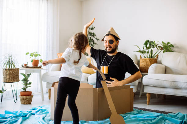istock Father Playing Exciting Adventure Game With Daughter 1300900649