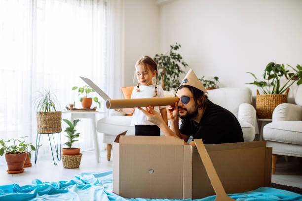 istock Father Playing Exciting Adventure Game With Daughter 1300900728