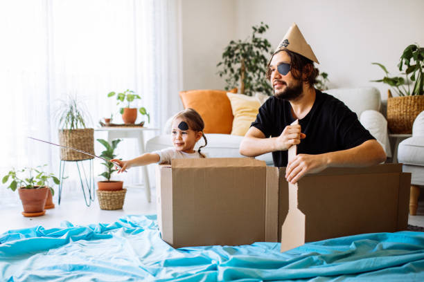 istock Father Playing Exciting Adventure Game With Daughter 1300900766