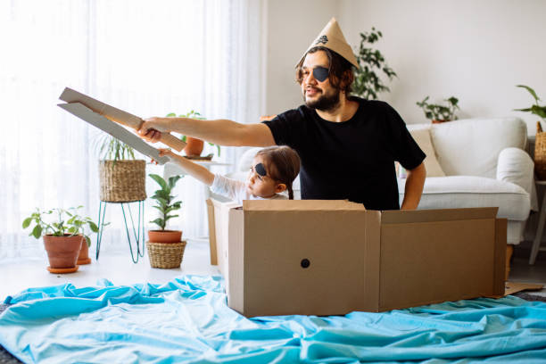 istock Father Playing Exciting Adventure Game With Daughter 1300902391
